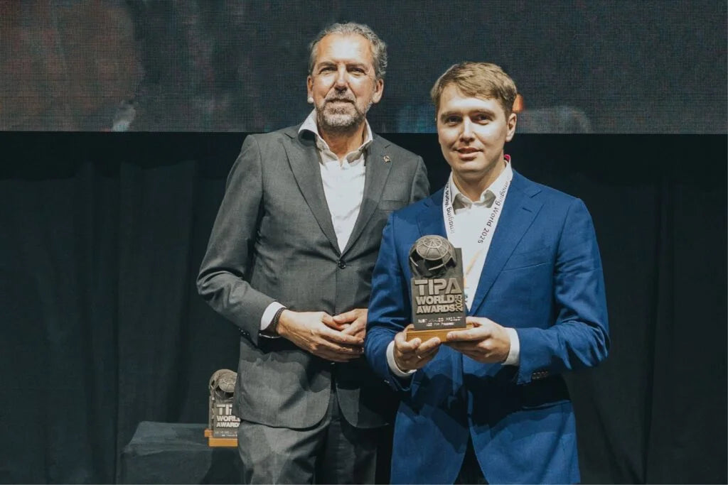 AGO Film Processor team receiving TIPA World Award 2025 for Best Analog Product at ceremony