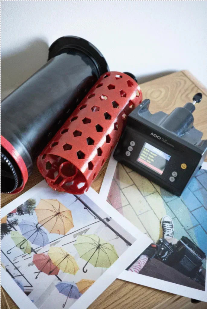 Darkroom colour printing workspace with AGO film processor and handmade RA-4 colour prints