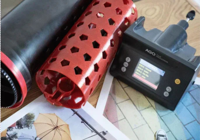 Darkroom colour printing workspace with AGO film processor and handmade RA-4 colour prints