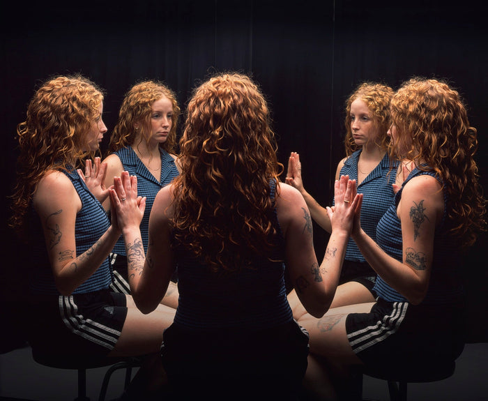 Multigraph portrait of a young woman with curly red hair, shown from five angles in one shot, photographed on Provia 100 sheet film in Barcelona