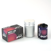 REFLX LAB 640T box, silver film canister, and 35mm cartridge side by side