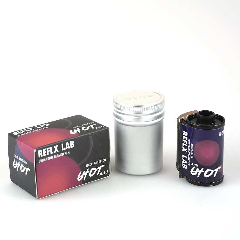REFLX LAB 640T box, silver film canister, and 35mm cartridge side by side