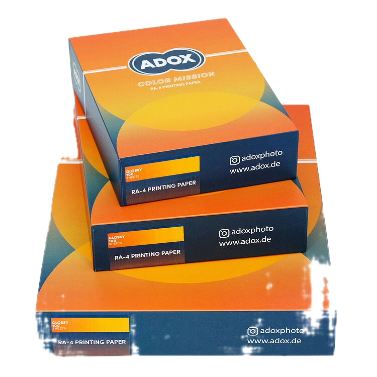 ADOX Color Mission RA-4 paper boxes stacked in three sizes showing full range of high gloss RC colour printing paper