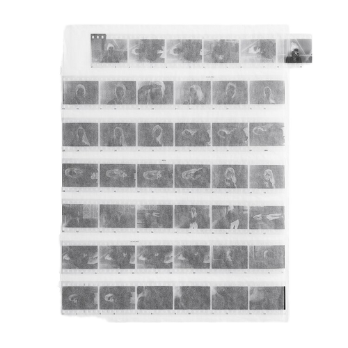Archival pergamine negative sleeves for 35mm film strips with seven pockets holding up to 42 frames