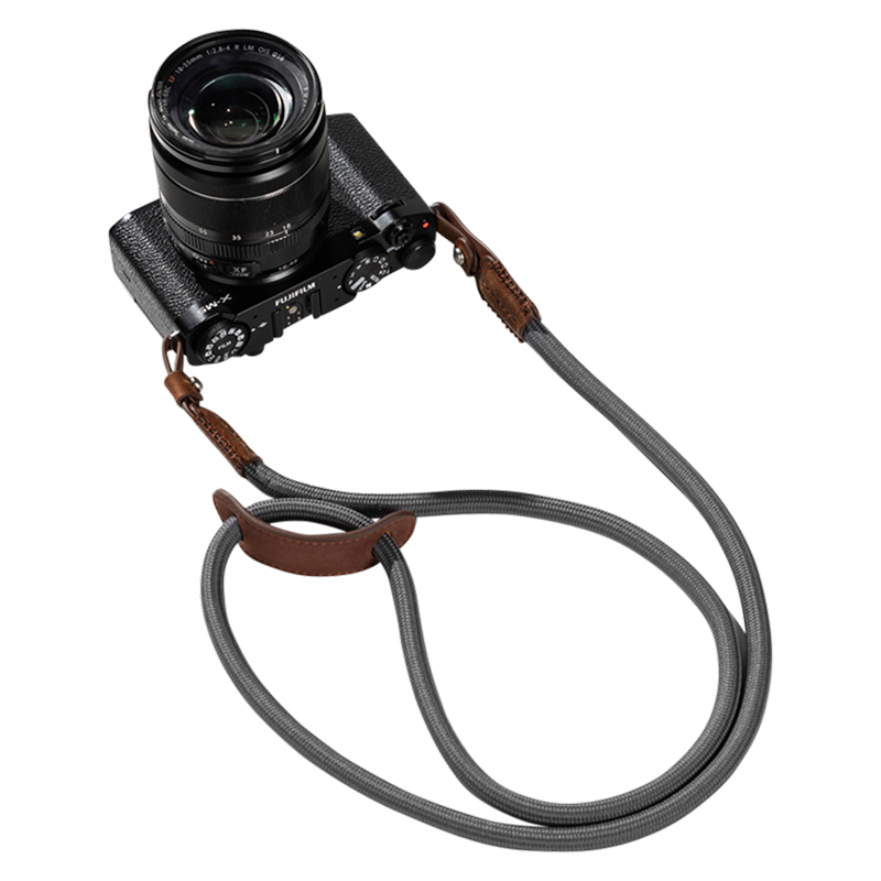 SmallRig braided shoulder strap in gray with brown leather ends on a camera