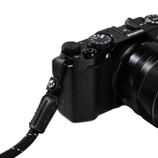 SmallRig braided shoulder strap in black attached to a camera, close-up