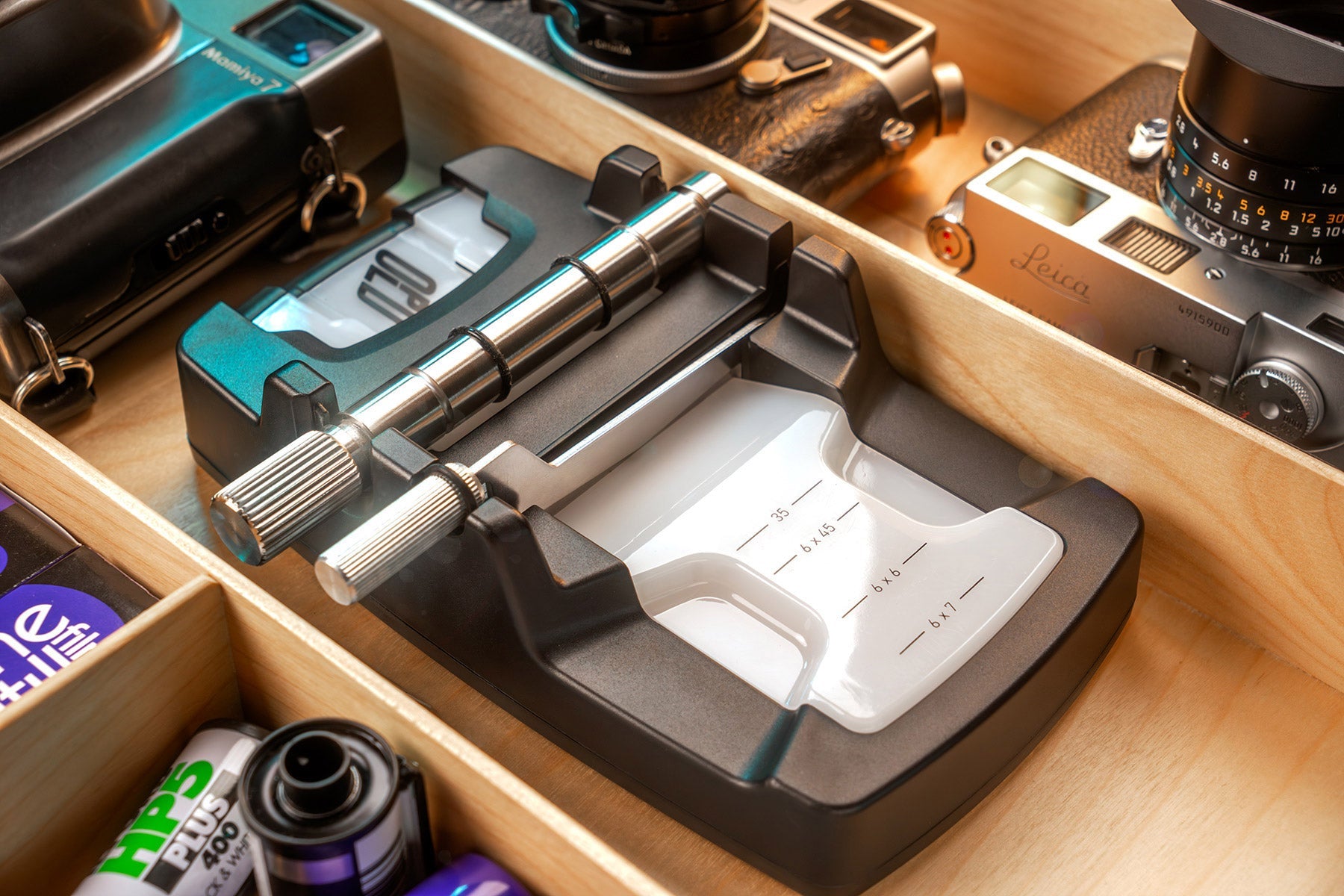 Optik Oldschool Film Killer film cutter stored in drawer