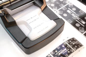 Optik Oldschool Film Killer film cutter showing multi-format cutting marks for 35mm and 120 film